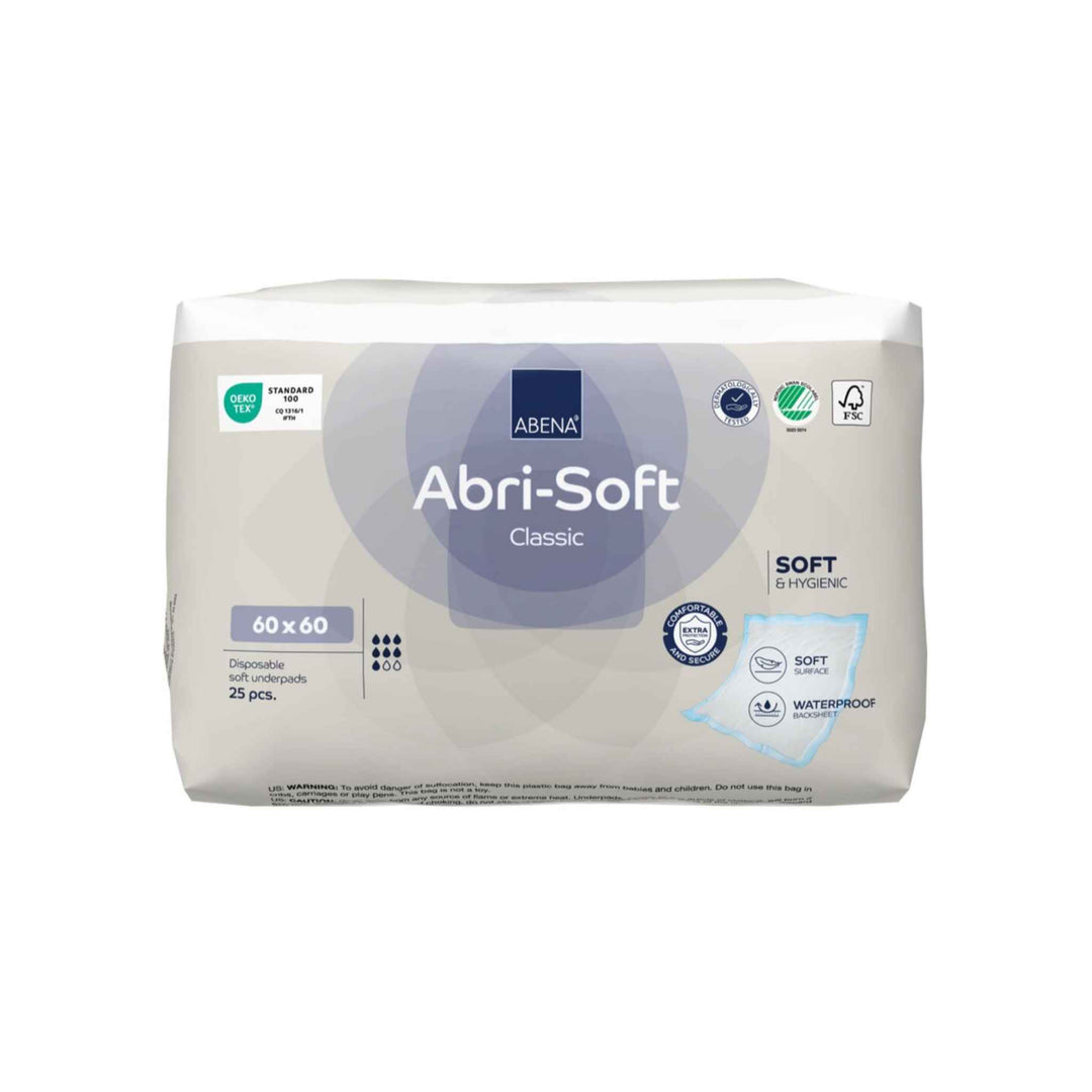 Engangsunderlag Abri Soft Classic 60×60 cm, 100 stk, absorberer 1300 ml, væsketæt bagside med forseglede kanter.