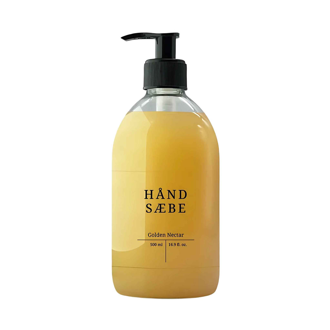 Flydende håndsæbe Golden Nectar 500 ml med pumpe, glycerin og milk & honey-duft, der efterlader hænder bløde og velplejede.